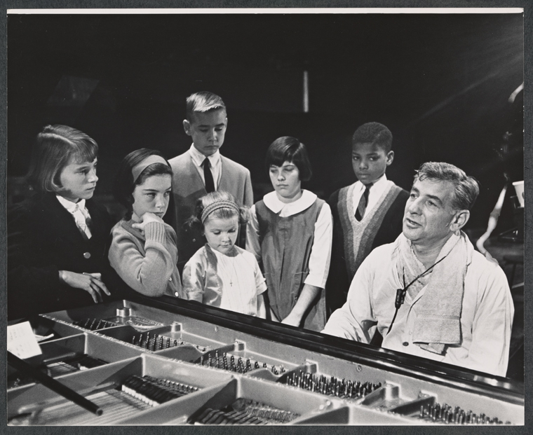 Unidentified children and Leonard Bernstein in rehearsal for the TV music series The Bell Telephone Hour - NYPL Digital Collections