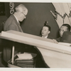 John Murray Anderson with Billy Rose and Noble Sissle seated at the piano at the nightclub Billy Rose's Diamond Horseshoe.