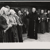 Albert Dekker [center], Patrick Hines, Michael Lombard [right] and unidentified others in the stage production The Devils