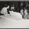 Rex Harrison (center) and unidentified people during rehearsal for the stage production My Fair Lady