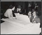 Rex Harrison (center) and unidentified people during rehearsal for the stage production My Fair Lady