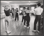 Michael Kidd [center] and unidentified others in rehearsal for the stage production Lil' Abner