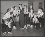 Michael Kidd, Julie Newmar [center] and unidentified others in rehearsal for the stage production Lil' Abner