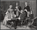 Eva Gabor [left] Reginald Gardiner [seated] and unidentified others in the stage production Little Glass Clock