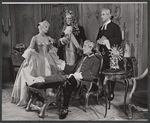 Eva Gabor [left], Reginald Gardiner [seated] and unidentified others in the stage production Little Glass Clock