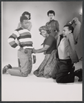 Sidney Poitier, Ruby Dee [partly obscured] Claudia McNeil, Diana Sands and Lonne Elder III in studio portrait from the original 1959 Broadway production of A Raisin in the Sun