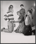 Sidney Poitier, Ruby Dee [partly obscured] Claudia McNeil, Diana Sands and Lonne Elder III in studio portrait for the original 1959 Broadway production of A Raisin in the Sun