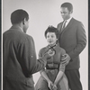 Lonne Elder III [back to camera] Diana Sands and Ivan Dixon in studio portrait from the original 1959 Broadway production of A Raisin in the Sun