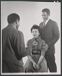 Lonne Elder III [back to camera] Diana Sands and Ivan Dixon in studio portrait from the original 1959 Broadway production of A Raisin in the Sun
