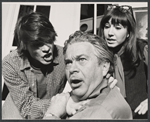 David Kerman, Cara Duff-MacCormick and unidentified [left] in the stage production Love Your Crooked Neighbor