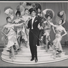 Performer and ensemble in the stage production The Merry Widow