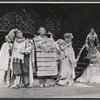 Hiram Sherman [foreground left], Dino Narizzano [foreground right], Eulalie Noble [seated background right wearing dark dress], Inga Swenson [seated middle ground right wearing light dress] and unidentified others in the 1959 American Shakespeare production of A Midsummer Night's Dream