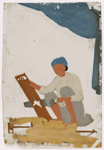 Seated male carpenter sawing a board, with tools on the ground