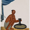 Seated male potter with pottery wheel