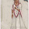 Woman in white sari holding blue umbrella, wearing jewelry and yellow pointed shoes