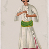 Man standing in pink pants, white shirt, and green sash