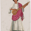 Musician with stringed instrument in white shirt and red scarf