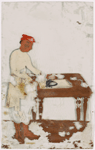 Man in white ironing at table