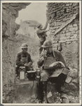 “Soldiers manning a portable trench phone…”
