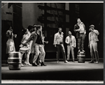 Sammy Davis, Jr., Johnny Brown (standing on barrel), and company in the stage production Golden Boy
