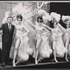 Steve Lawrence and showgirls in the stage production Golden Rainbow