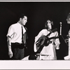 Joan Baez [center] and unidentified others in the 1964 stage event Salute to the President