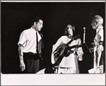 Joan Baez [center] and unidentified others in the 1964 stage event Salute to the President