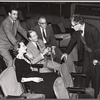 Cole Porter [center], George S. Kaufman [right] and unidentified others in rehearsal for the stage production Silk Stockings