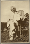 Five photographs. SLC in a wicker chair, summer 1908, Redding, CT.