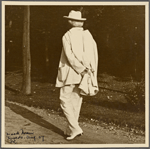 Six photographs of SLC strolling in white suit at Tuxedo, Aug. 1907. SLC walking away from camera, hands behind back.