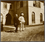 Three photographs of SLC and William Dean Howells at Redding, Connecticut. October 1908. Middle distance against house.