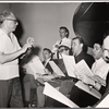 Philip J. Lang [left] and unidentified others in rehearsal for To Broadway with Love