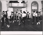 Dancing ensemble in rehearsal for To Broadway with Love