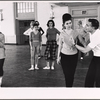 Dancing ensemble in rehearsal for To Broadway with Love