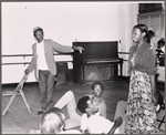 Avon Long [standing at left], Marion Ramsey [standing at right] and unidentified others in rehearsal for the pre-Broadway tryout of the production Miss Moffat