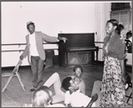 Avon Long [standing at left], Marion Ramsey [standing at right] and unidentified others in rehearsal for the pre-Broadway tryout of the stage production Miss Moffat
