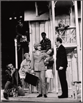 Martha Schlamme [seated on ladder], Patti Karr [center front holding case], Joe Morton [center background], Pamela Hall [center middle], Dan Resin [standing right] and unidentified in the stage production A Month of Sundays