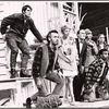 Martha Schlamme [wearing necklaces], Dan Resin [wearing in bowtie], Patti Karr [wearing hat], Joe Morton [kneeling], Pamela Hall [in fur coat] and unidentified others in the stage production A Month of Sundays