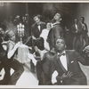 Scene from unidentified dance performance with Alvin Ailey (standing at center) and Charles Moore (in foreground)