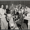 Cast in rehearsal for the stage production Dinner at Eight. Foreground: director Tyrone Guthrie and Blanche Yurka. Middle row: Ruth Ford, Arlene Francis, Robert Burr, June Havoc and Darren McGavin. Back row: Walter Pidgeon, Pamela Tiffin, and Jeffrey Lynn.