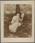 Leo Tolstoy reading outdoors. 