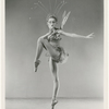 Full-length studio portrait of Tanaquil Le Clercq posing on pointe in costume for "Metamorphosis"