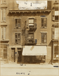 Old tenement with ground floor candy store