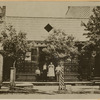 Mrs John F. Dunker & others outside beer hall(?)