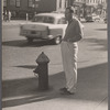 Man at curb, New York City