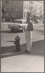 Man at curb, New York City