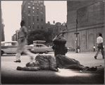 Man with crutches, asleep on the sidewalk. Rear of Grace Church Buildings. 4th Avenue and 10th Street