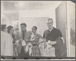 Morton Feldman (2nd from left) at an opening