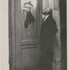 Henry Cowell at entrance to exhibition