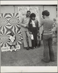 Untitled (couple getting picture taken, little girl laughing)